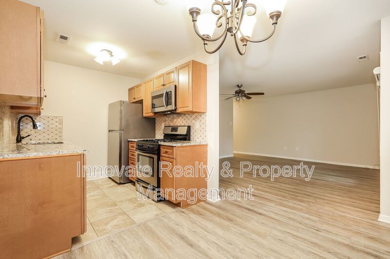 Beautifully maintained first-floor condo located in the desirable Tavistock community property image