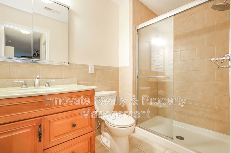 Beautifully maintained first-floor condo located in the desirable Tavistock community property image