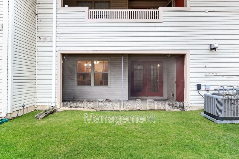 Beautifully maintained first-floor condo located in the desirable Tavistock community property image